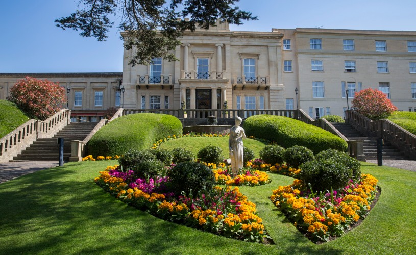 Statue and gardens in front of Macdonald Bath Spa Hotel